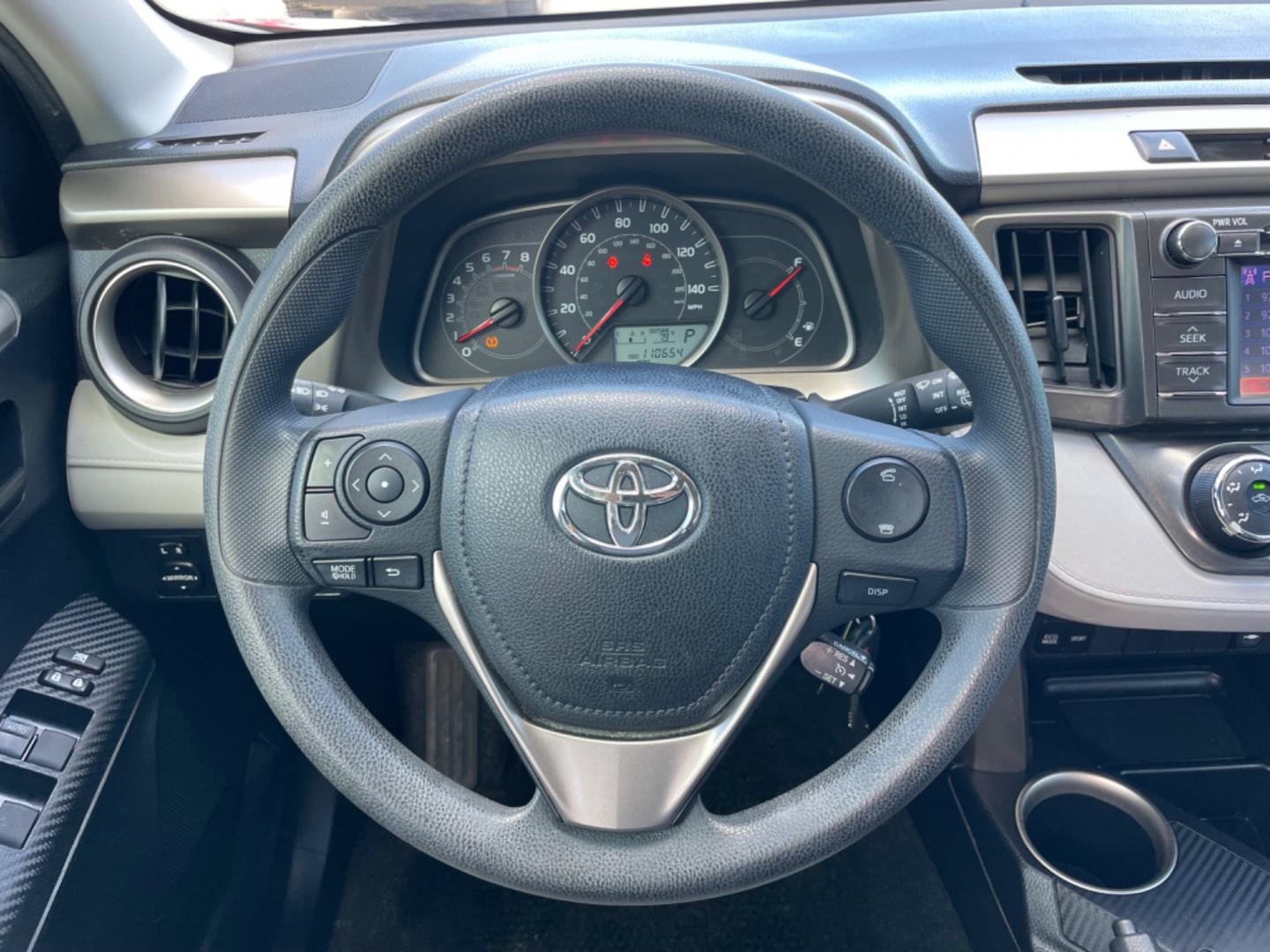 2013 Red /Silver Toyota RAV4 LE (2T3ZFREV0DW) with an 2.5L engine, Automatic transmission, located at 1501 West 15th St., Houston, 77008, (713) 869-2925, 29.797941, -95.411789 - Photo#8